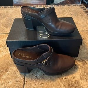 Brown cole Hana clogs.
